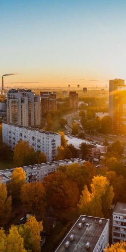 aerial-view-of-white-concrete-buildings-during-golden-hours-681368